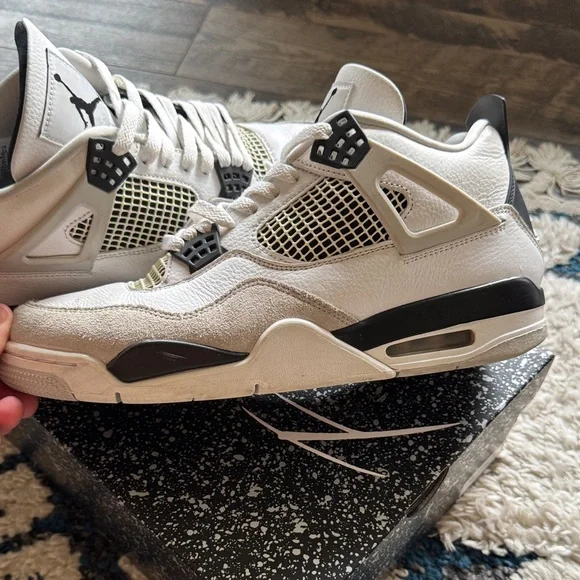 Air Jordan 4 Retro White and Black Sneakers